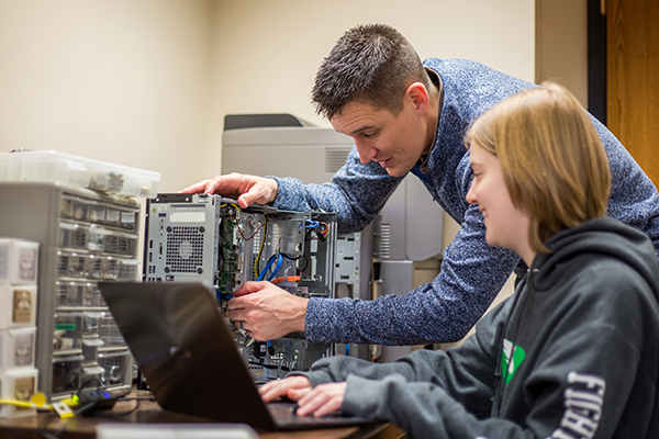 Employees Working At a Computer