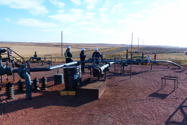 EERC employees working on pipelines