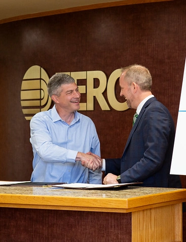 two men shaking hands